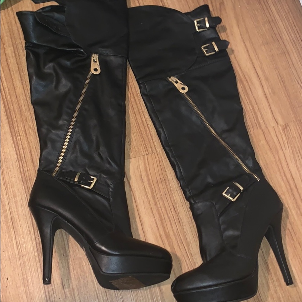 Knee length heel boots